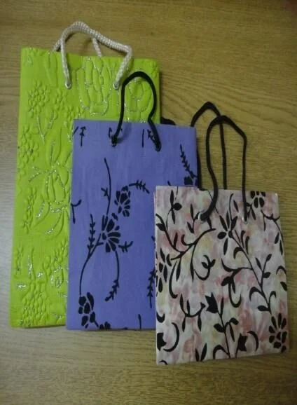 Now: printed paper gift bags made by MSS women