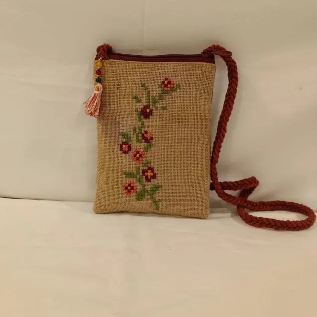 Jute mobile sling bag with cross-stitch roses