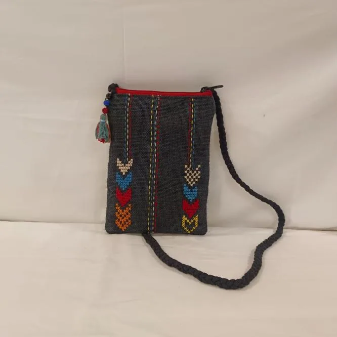 Grey mobile sling bag with a cross-stitch arrow motif