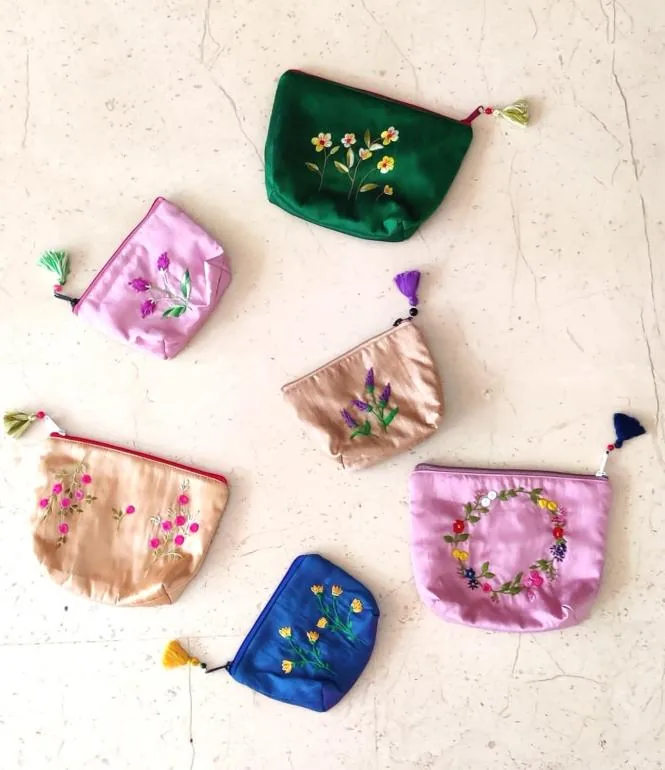 Silk coin pouches with hand-embroidered flowers