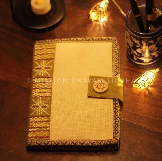 Hand-painted jute diary cover with a button clasp