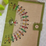 Jute folder hand painted with Warli dancers